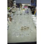 A COLLECTION OF DRINKING GLASSES TO INCLUDE; 6 WHITE WINES, WHISKEY TUMBLERS, CHAMPAGNE FLUTES,