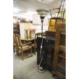 ART DECO BLACK JAPANNED AND SILVERED METAL UPLIGHTER FLOOR LAMP, with three part conical shade and