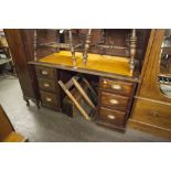 CIRCA 1920's MAHOGANY KNEEHOLE DESK, THE PEDESTAL DRAWERS WITH BRASS CUP HANDLES, PLINTH BASE