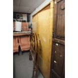 AN ART DECO BIRDSEYE MAPLE AND WALNUT DOUBLE GENTLEMAN'S WARDROBE, SOLID DOORS AND SHAPED HANDLES