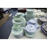 A LARGE QUANTITY OF WOODS WARE 'BERYL' PLAIN GREEN POTTERY DINNER WARES