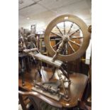 A BEECH SPINNING WHEEL, BY ASHFORD, MADE IN NEW ZEALAND, WITH PLAQUE