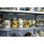 A SELECTION OF POTTERY BEER STEINS, BOOKS AND SOUVENIR SPOONS