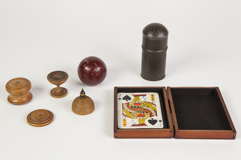 MAGICIANS PROPS VIZ A PEWTER SHAKER with false top and a HOLLOW METAL BALL containing red fabric