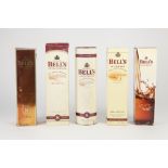 TWO BOXED 70CL BOTTLES OF BELLS EXTRA SPECIAL - OLD SCOTCH WHISKY, 8 YEARS OAK AGED, (one in tin