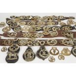 COLLECTION OF HORSE BRASSES, including some on leather straps