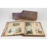 TWO VICTORIAN SCRAP BOOKS with pictorial covers and OTHER VICTORIAN SCRAP ALBUMS containing a