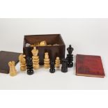 MID 20TH CENTURY BOXWOOD AND EBONY STAUNTON PATTERN CHESS SET the height of the king 4" high in