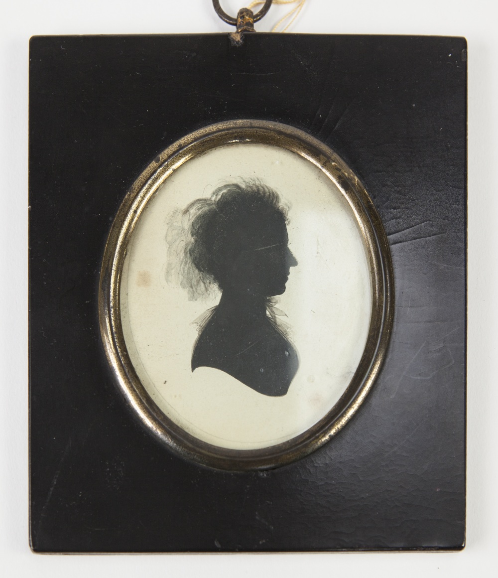 JOHN MIERS PAINTED SILHOUETTE PORTRAIT OF A LADY Oval, in rectangular ebonised frame 3 1/4" x 2 3/4"