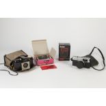 OLYMPUS TRIP 35 ROLL FILM CAMERA, in soft case, together with a KODAK BROWNIE 127, in soft case,