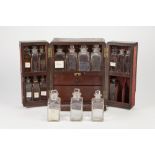 19TH CENTURY APOTHECARY'S MAHOGANY TRAVELLING BOX with flush fitting brass carry handle, fitted