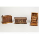 SIX VARIOUS WOODEN CIGARETTE BOXES one having spring loaded cigarette retrieval action another by