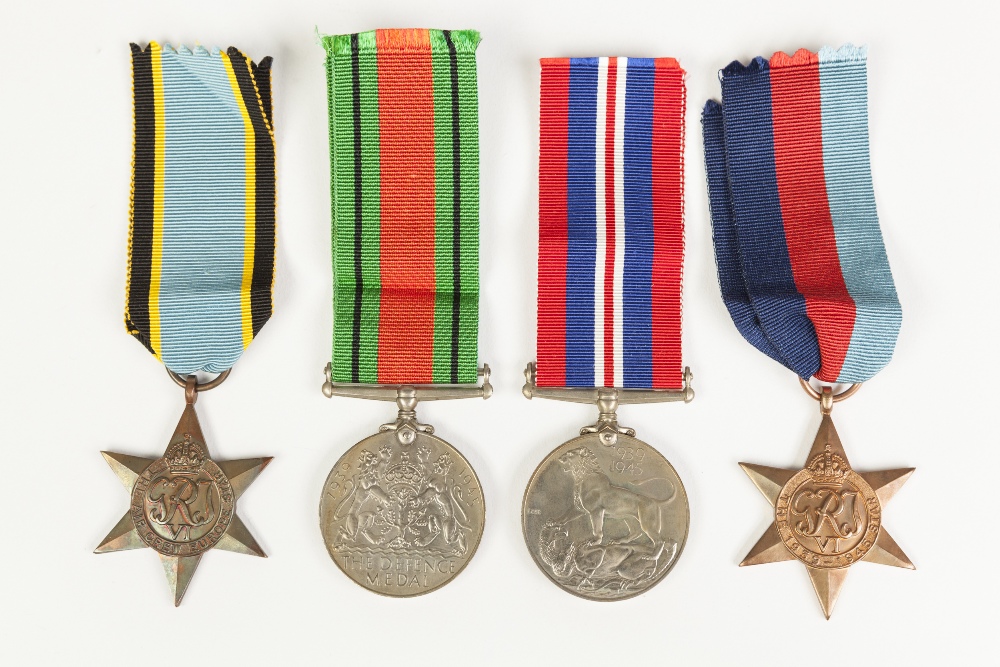 GROUP OF FOUR WORLD WAR II SERVICE MEDALS INCLUDING AIR CREW EUROPE STAR AWARDED TO FLYING OFFICER