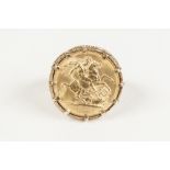 1958 GOLD SOVEREIGN (VF) claw set in 9ct gold ring with pierced decoration, 15.2 gms gross