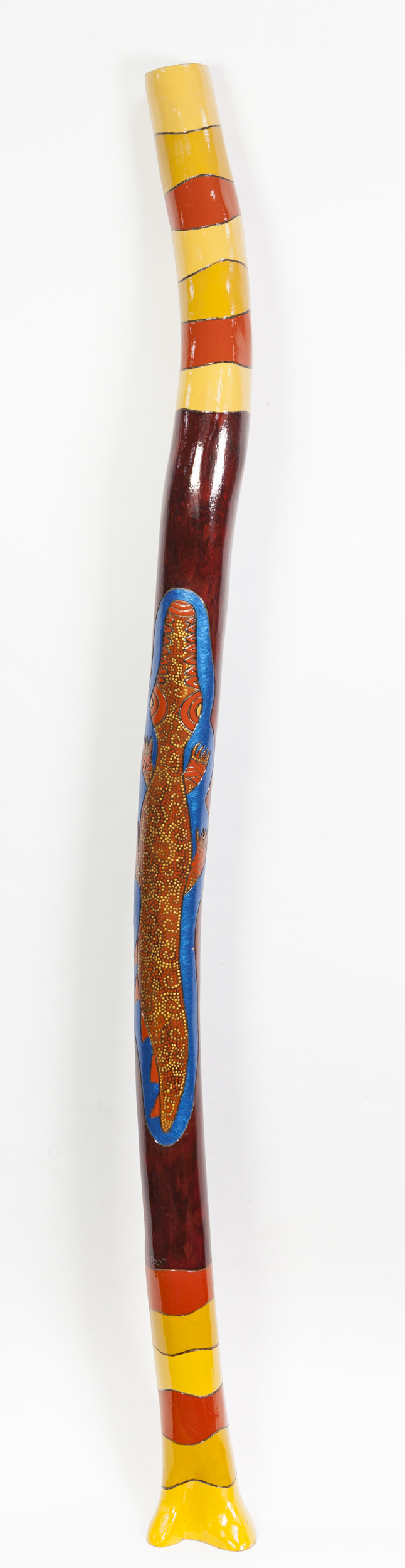 A MODERN AUSTRALIAN ABORIGINAL PAINTED WOODEN DIDGERIDOO, signed 'Naiuwa 2003', 59 1/2" (151cm) long