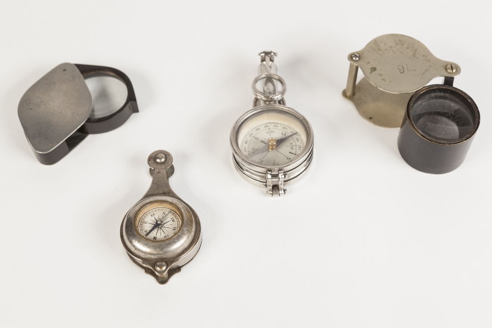 FRENCH, EARLY TWENTIETH CENTURY PLATED METAL CASED COMPASS, having two pairs of fold out monocle