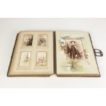 LATE VICTORIAN EMBOSSED LEATHER PHOTOGRAPH ALBUM OF SIXTEEN LEAVES, some with pictorial decoration