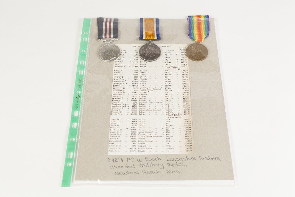 TWO WORLD WAR I SERVICE MEDALS awarded to 24294 Pte. W. Booth (Military medal winner) Lan. Fus viz