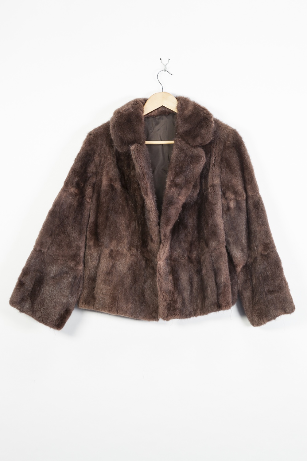 LADIES NATURAL MINK SHORT CAPE, cut with two vents, ANOTHER SLIGHTLY DARKER AND A LADIES SHORT FUR