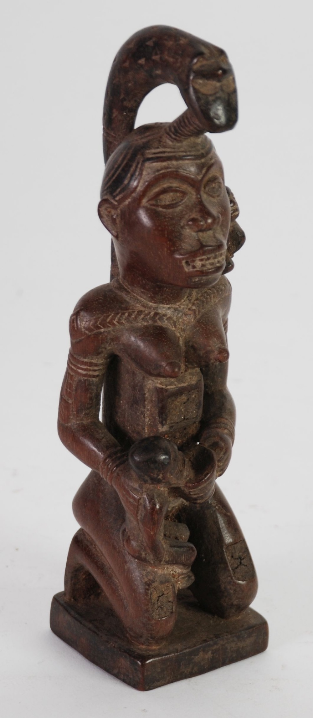 SIX AFRICAN CARVED WOOD MATERNITY FIGURES, comprising: TWO REPUBLIC OF CONGO EXAMPLES, each modelled