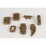 SEVEN EARLY TWENTIETH CENTURY BRASS NOVELTY VESTA BOXES, including OWL WITH HINGED HEAD, 2 1/4" (5.