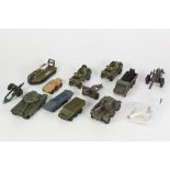 TWELVE, MAINLY DINKY TOYS, DIE CAST MILITARY VEHICLES AND GUNS IN PLAYWORN CONDITION, to include