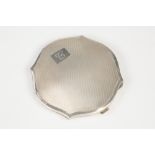 SILVER SHAPED CIRCULAR POWDER COMPACT, with engine turned decoration, interior mirror, Birmingham