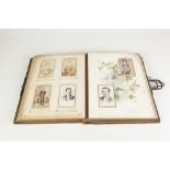 GOOD LATE VICTORIAN EMBOSSED LEATHER AND MUSICAL PHOTOGRAPH ALBUM, the front embossed with flowers