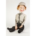 20th CENTURY MOULDED PLASTIC VENTRILOQUISTS DUMMY WITH MOVING HEAD, MOUTH AND EYES, having red