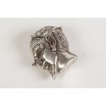 EDWARDIAN CAST SILVER VESTA BOX IN THE SHAPE OF A FAUNS HEAD, the nose incorporating a push button