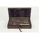 ROSEWOOD CASED SET OF DRAWING INSTRUMENTS, with plush lined lift-put tray, and brass plaque to the