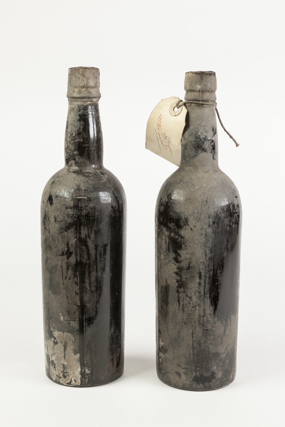 TWO BOTTLES OF COCKBURN & CAMPBELL PORT, 1927, no labels, (2)