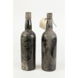 TWO BOTTLES OF COCKBURN & CAMPBELL PORT, 1927, no labels, (2)