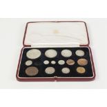 GEORGE VI SET OF FIFTEEN SPECIMEN COINS, in gilt tooled red morocco case