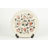 MOTHER OF PEARL AND HARDSTONE INLAID ALABASTER CIRCULAR PLAQUE, decorated in coours with