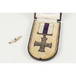 GEORGE V MILITARY CROSS WITH RIBBON, IN ORIGINAL MILESTONE SHAPED PURPLE MOROCCO AND GILT BOX,