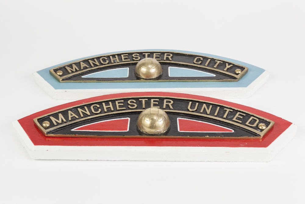 TWO CAST BRASS AND WOOD MOUNTED REPLICA LOCOMOTIVE NAME PLATES, 'Manchester United' and '