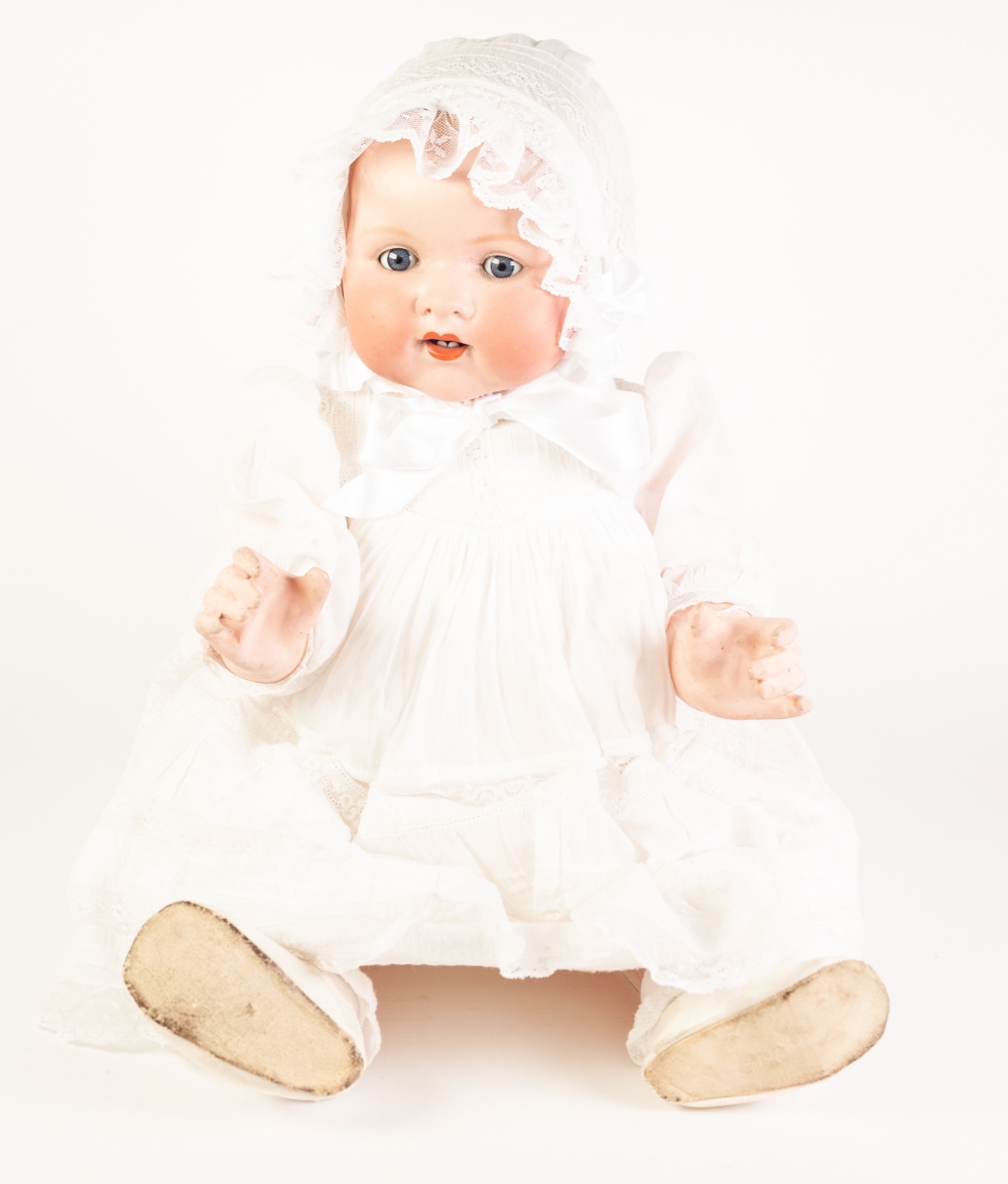 AN EARLY TWENTIETH CENTURY ARMAND MARSEILLE BISQUE HEAD BABY DOLL, with sleeping blue eyes and