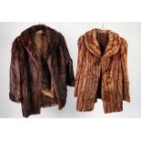 BROWN MINK THREE QUARTER LENGTH COAT, with shawl collar, slit pockets, hook fastening, 33" long