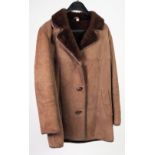 LADY'S BROWN SHEEP SKIN THREE QUARTER LENGTH JACKET, with reversed and revered collar, leather trim,