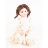 FRENCH, PROBABLY SFBJ BISQUE HEADED 'PETITE' BABY DOLL with bisque head, fixed blue 'paperweight'