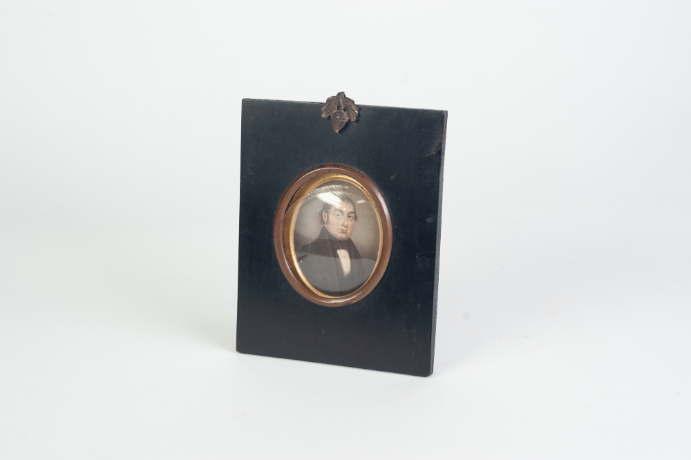 BRITISH SCHOOL (Nineteenth Century) OVAL PORTRAIT MINIATURE on paper of a gentleman facing right