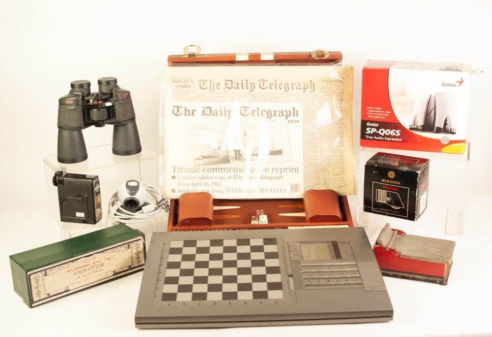 KASPAROV PRISMA CHESS COMPUTER, also a leather cased BACKGAMMON SET, and a pair of PRAKTICA SPORT 12