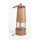 A BRASS CASED PROTECTOR LAMP AND LIGHTING TYPE 6 MINISTRY OF POWER MINERS SAFETY LAMP