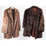 GREY BROWN MUSQUASH FULL LENGTH COAT, with revered collar, slit pockets, hook fastening and a