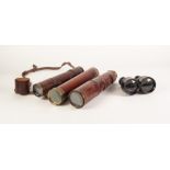 A LATE VICTORIAN FOUR DRAW BRASS AND MAHOGANY NAVAL TELESCOPE in leather case, TWO OTHERS AND A