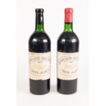 TWO BOTTLES OF CHATEAU DUCRU-BEAUCAILLOU SAINT-JULIEN 1957 MEDOC RED WINE (one with red foil absent)