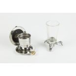 DALVEY SILVER PLATED COLLAPSIBLE SPIRIT CUP, in disc shaped pocket case and a GLASS STIRRUP CUP with