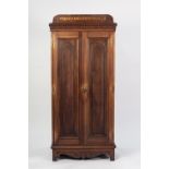EARLY TWENTIETH CENTURY CARVED MAHOGANY MEDAL COLLECTORS CABINET, the moulded oblong top above a