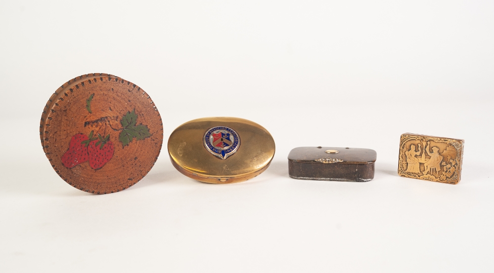 AN OVAL BRASS SNUFF BOX, the hinged covered centred with an enamelled coat of arms and motto